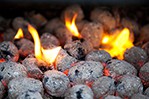 burning charcoal briquettes